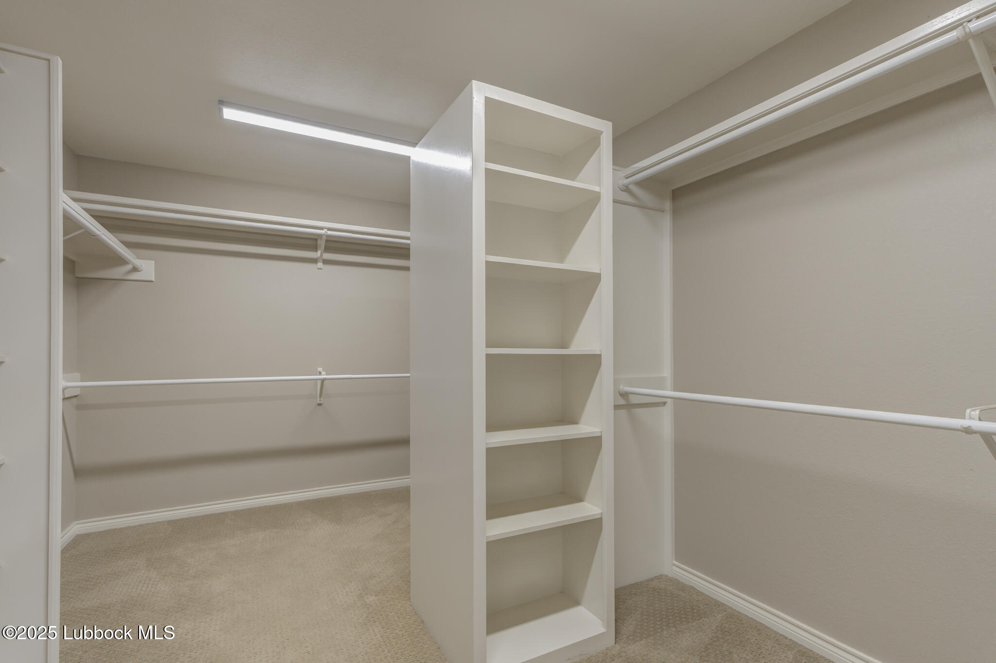 9406 Wayne Avenue Lubbock, TX 79424 - Photo 41 of 67 a view of an empty walk in closet