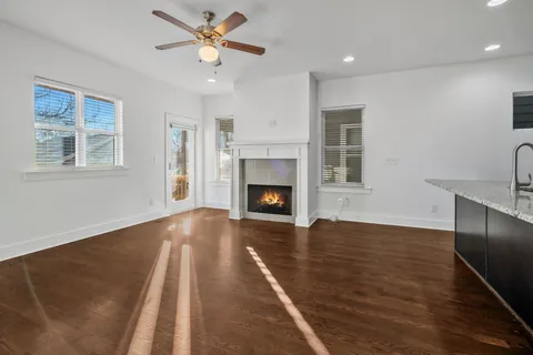 a view of balcony with wooden floor