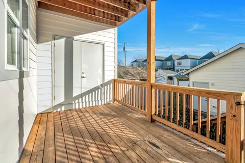 a view of a brick building from a balcony