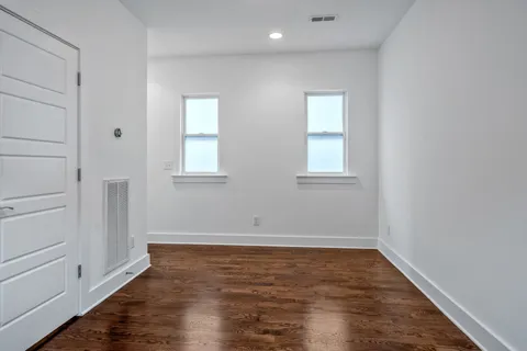 a view of storage and utility room with racks on the wall