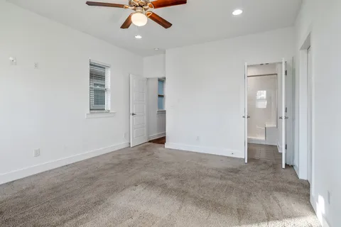 a view of a balcony with a floor to ceiling window