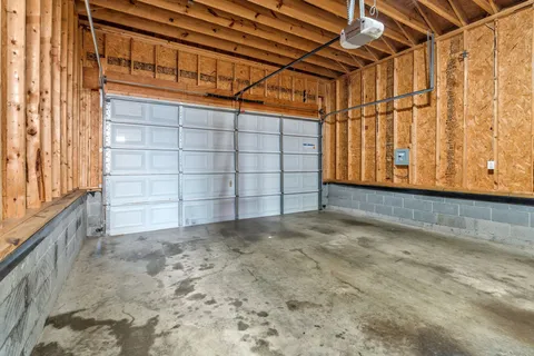 a view of an empty room with stairs