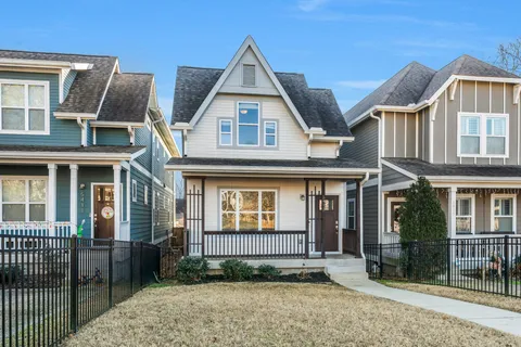 a view of a balcony with a floor to ceiling window