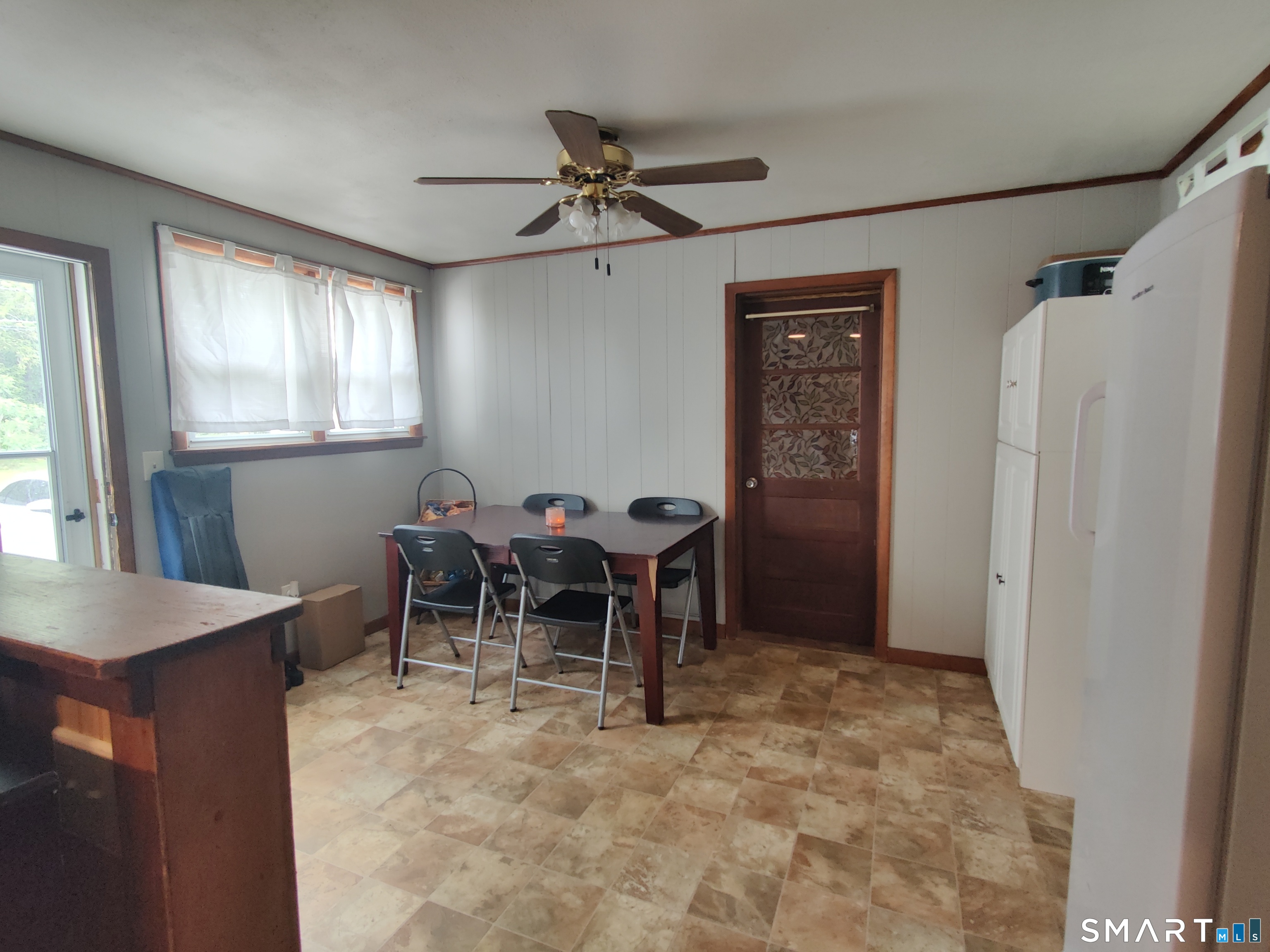35 Brook Road Enfield, CT 06082 - Photo 3 of 25 a dining room with furniture and window