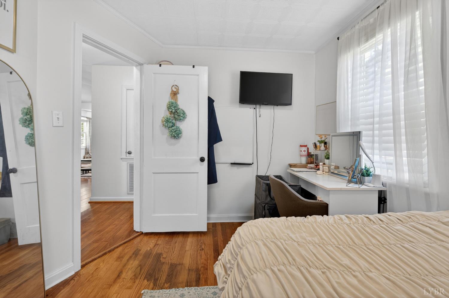 1305 Harding Street Lynchburg, VA 24502 - Photo 11 of 33 a bedroom with a bed and a flat screen tv