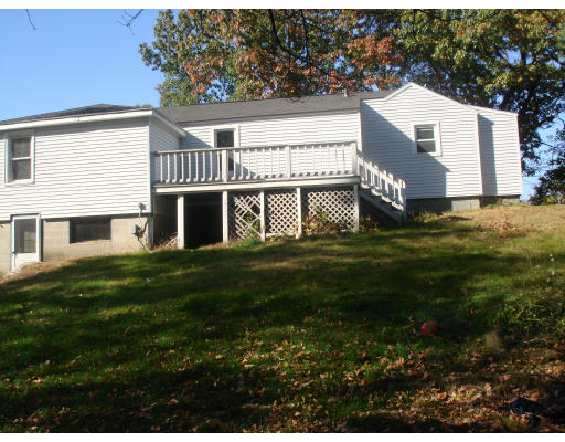 14 Harback Road Sutton, MA 01590 - Photo 3 of 8 a view of a house with a yard