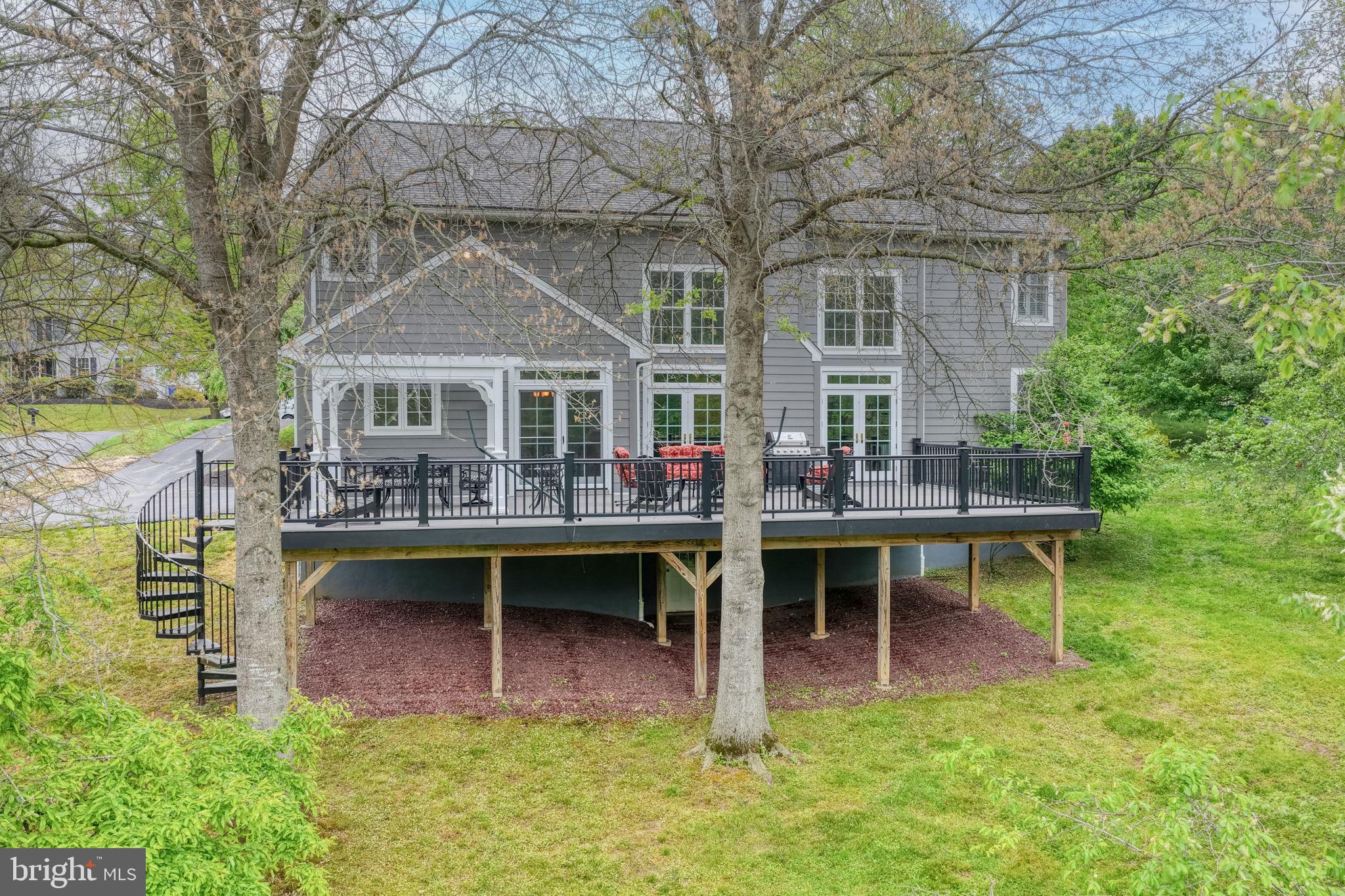 357 Willits Way Garnet Valley, PA 19060 - Photo 55 of 63 a view of a house with backyard porch and sitting area