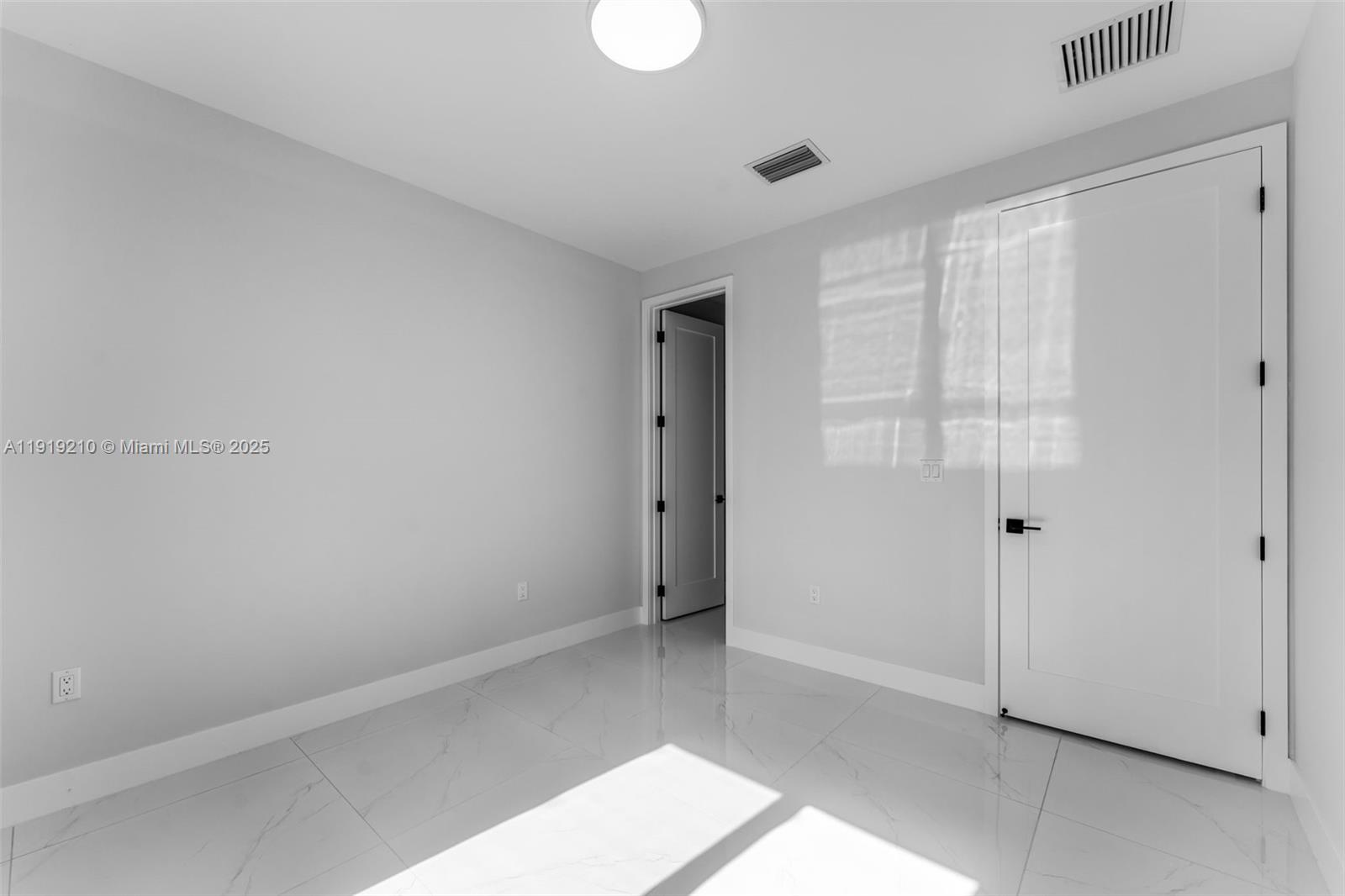 12383 Southwest 220th Street Miami, FL 33170 - Photo 13 of 20 a view of an empty room