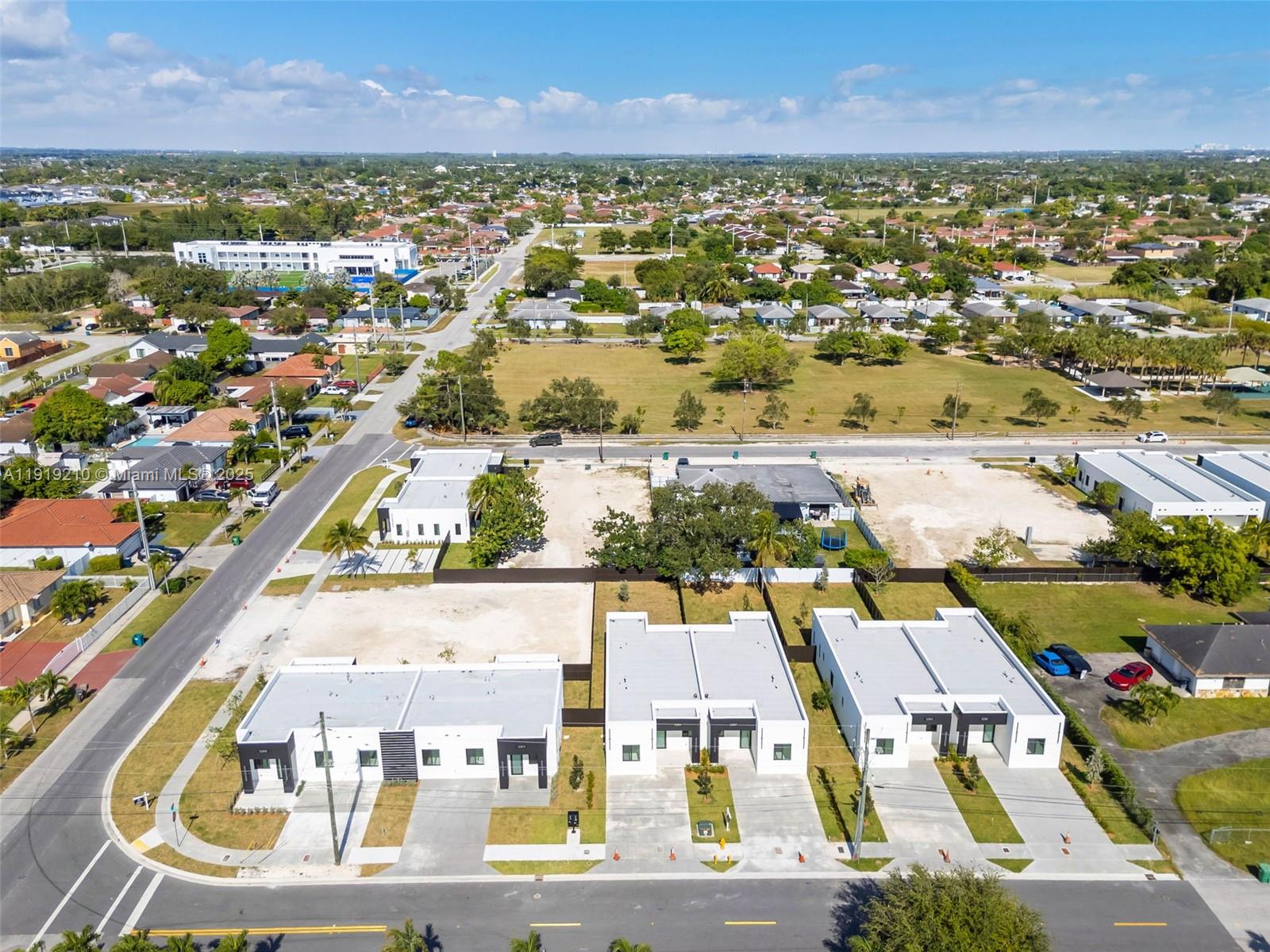 12383 Southwest 220th Street Miami, FL 33170 - Photo 20 of 20 an aerial view of residential houses with outdoor space