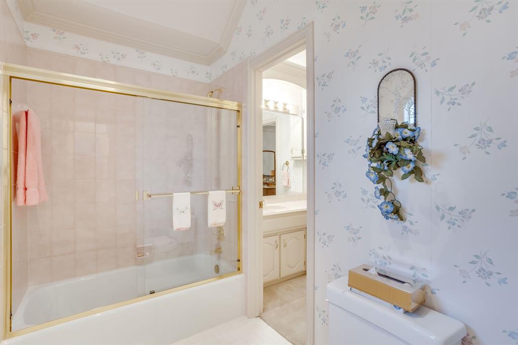 3068 High Ridge Drive Grapevine, TX 76051 - Photo 25 of 40 Bathtub with gold-tone framed glass enclosure and integrated towel bar