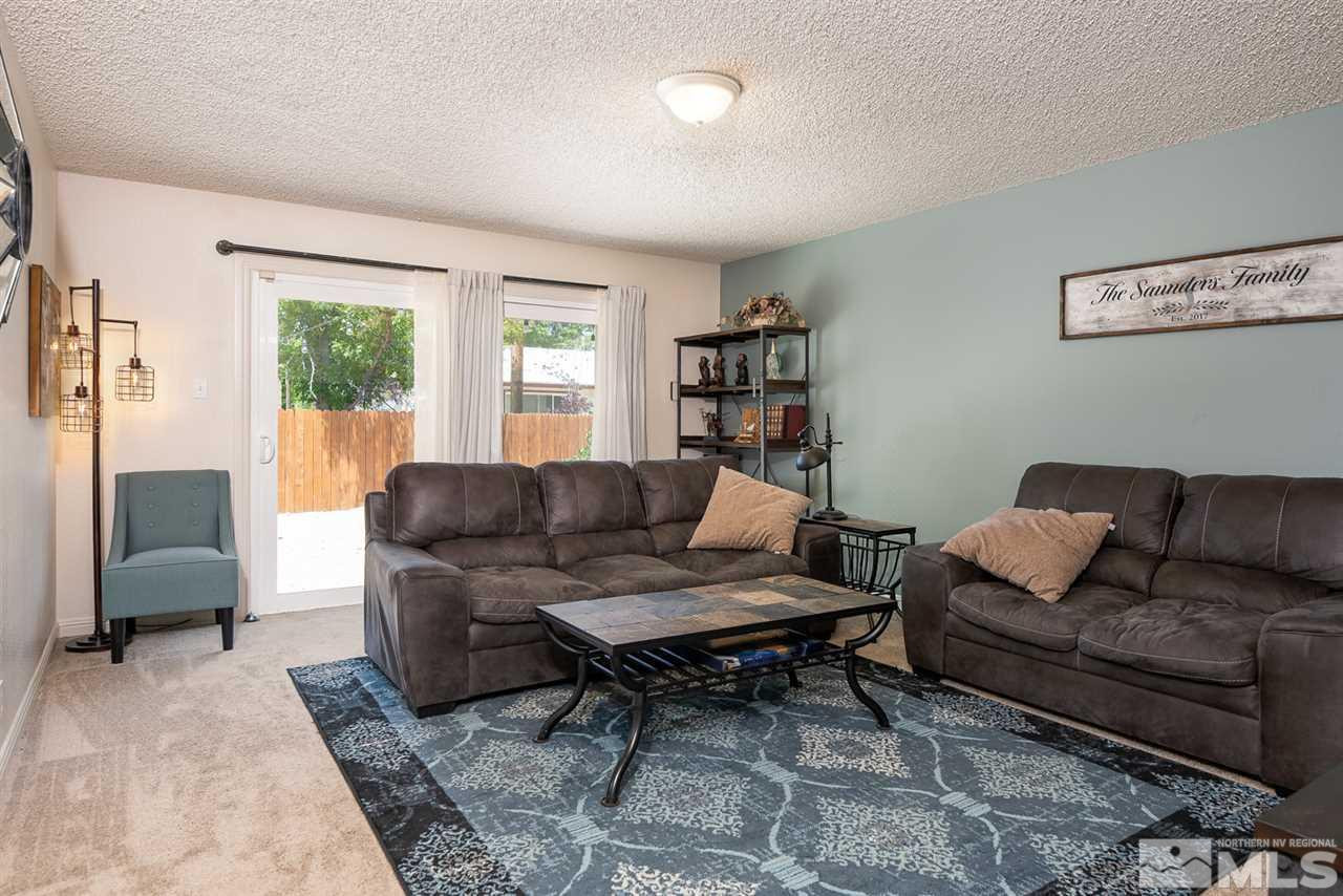 3425 Pierremont Road Reno, NV 89503 - Photo 11 of 28 a living room with furniture and a rug