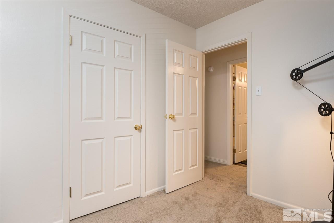 3425 Pierremont Road Reno, NV 89503 - Photo 25 of 28 a view of a hallway with closet area