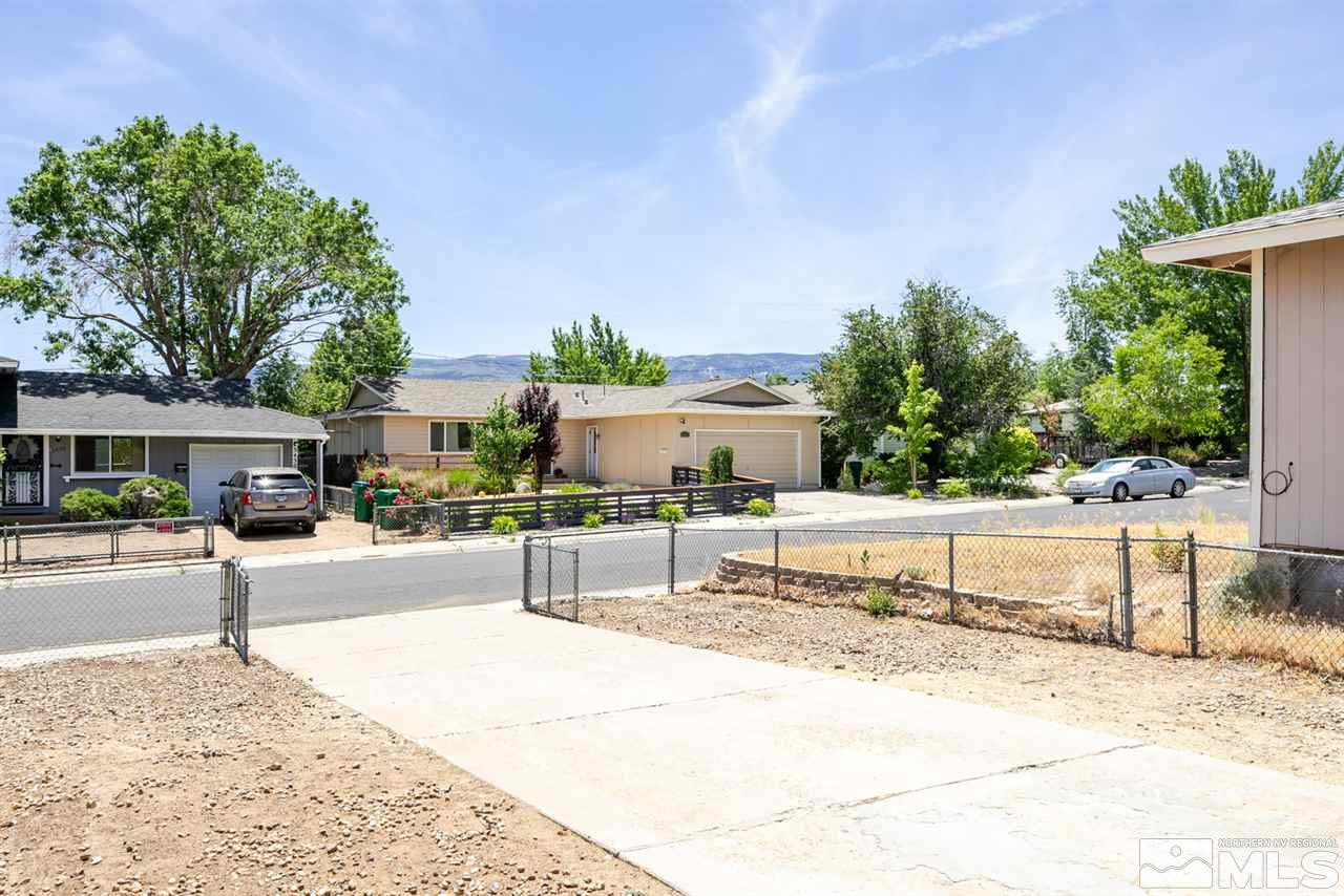 3425 Pierremont Road Reno, NV 89503 - Photo 4 of 28 a view of a terrace with a bench and trees