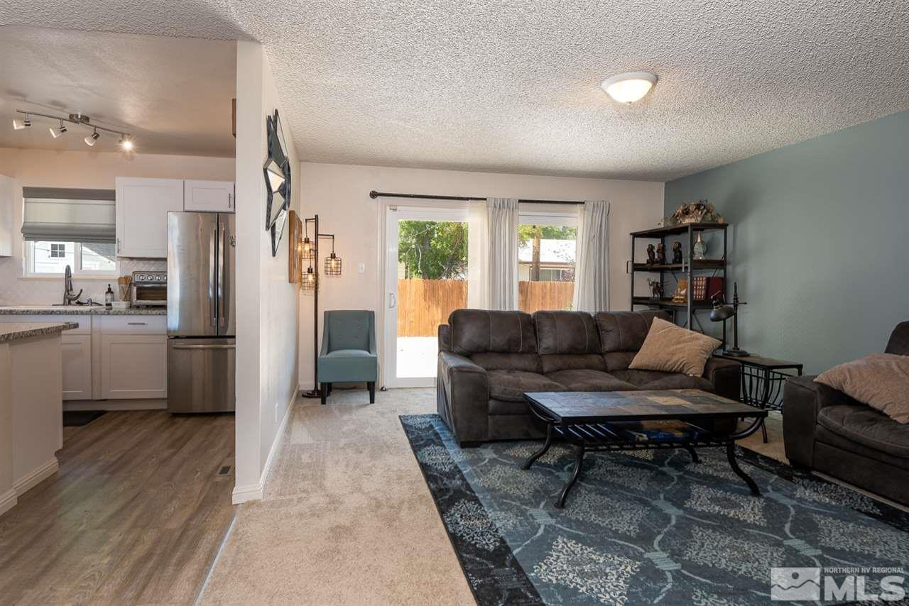 3425 Pierremont Road Reno, NV 89503 - Photo 10 of 28 a living room with furniture and a large window