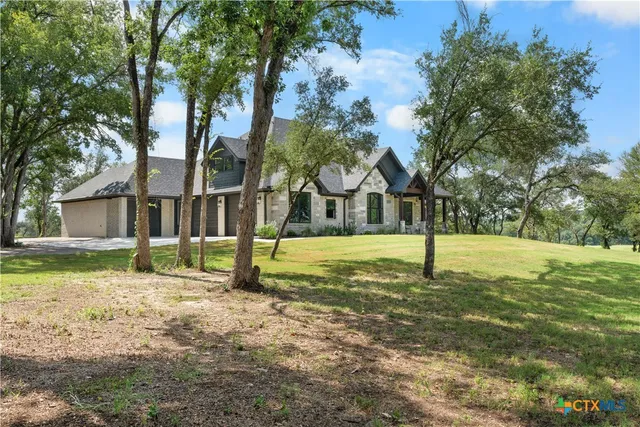 a view of swimming pool with tree s