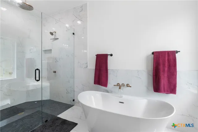 a bathroom with a sink and a shower