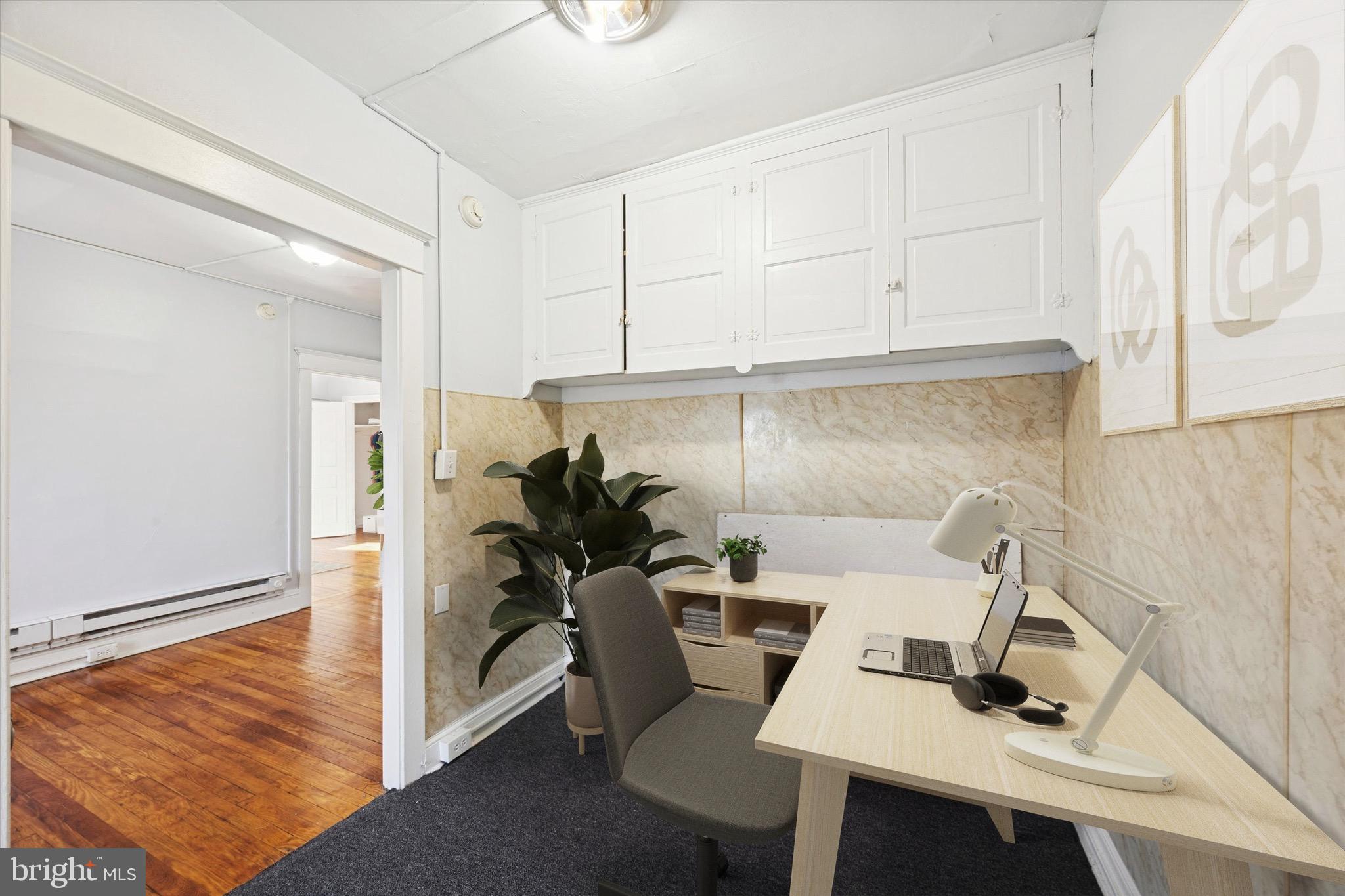 330 Kerlin Street, Unit 3 Chester, PA 19013 - Photo 11 of 15 a workspace with furniture and window