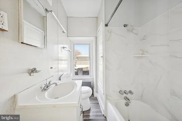 a bathroom with a sink and a bathtub