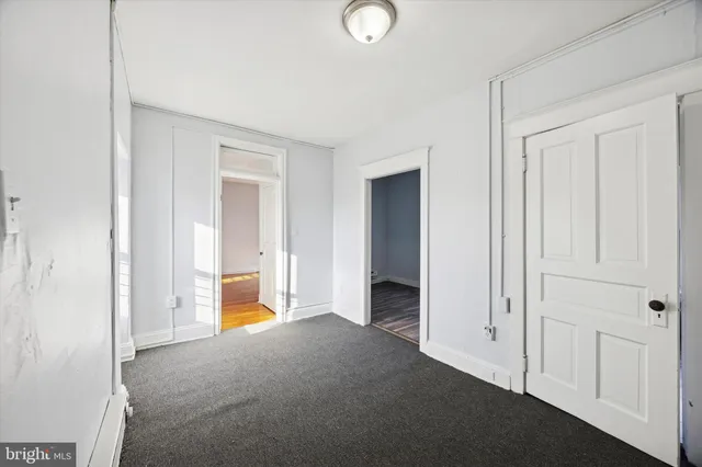 a workspace with furniture and window