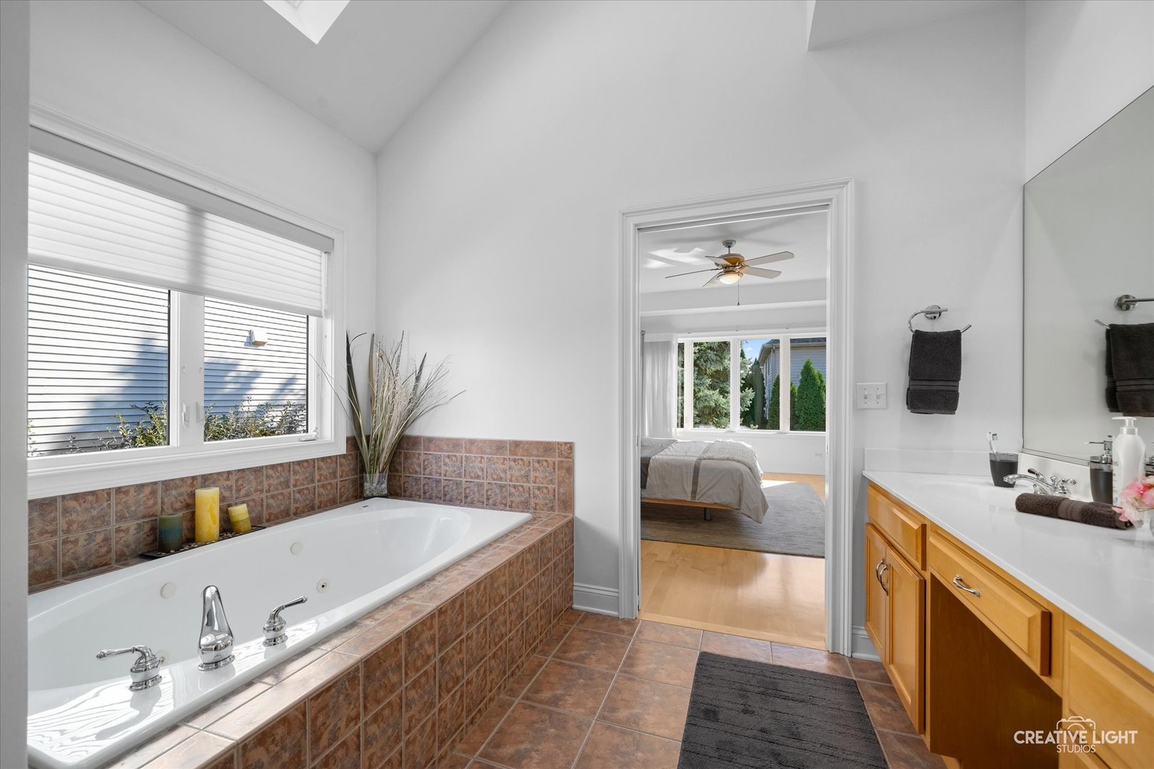 3912 Highknob Circle Naperville, IL 60564 - Photo 18 of 42 a spacious bathroom with a tub double sink and mirror