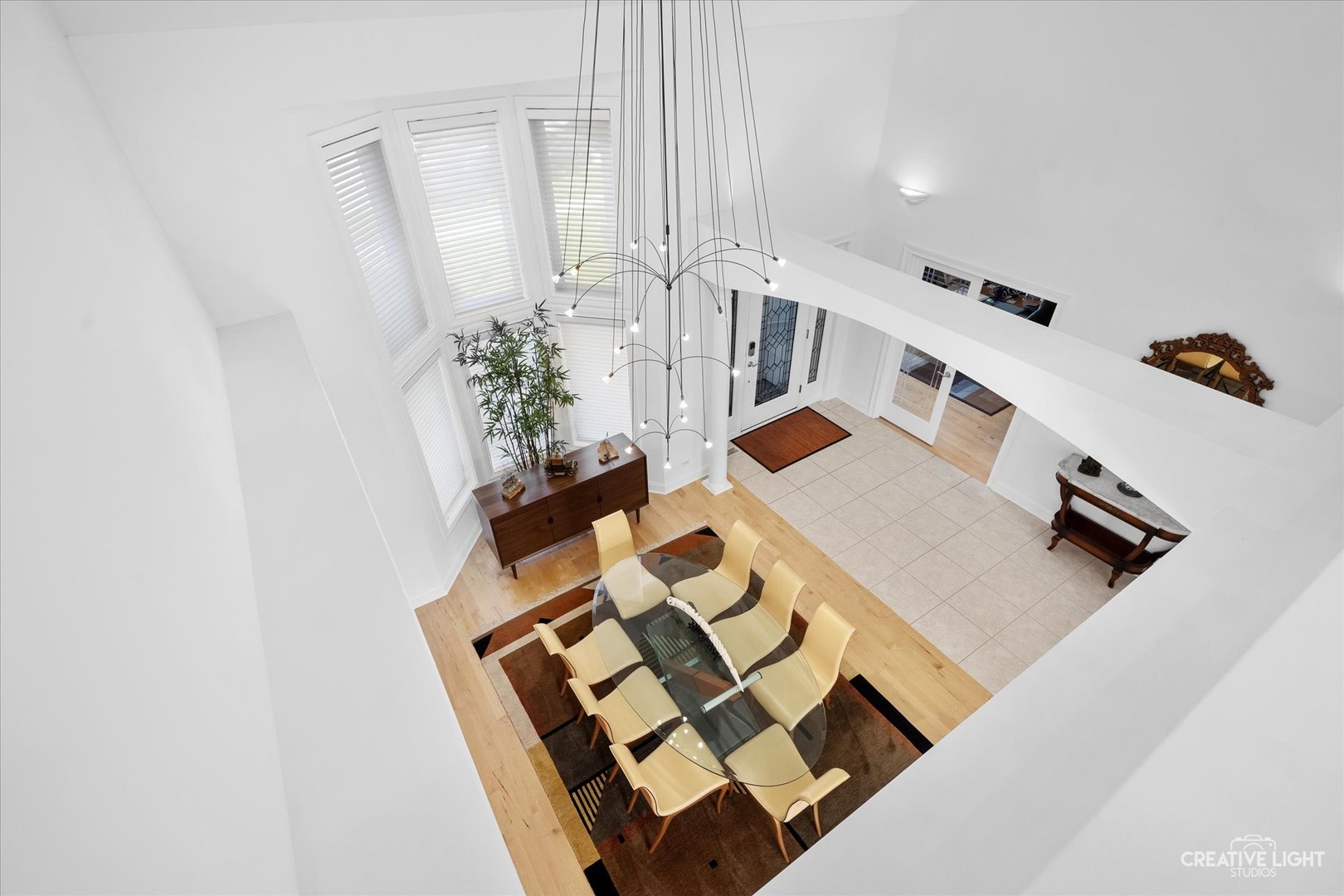 3912 Highknob Circle Naperville, IL 60564 - Photo 20 of 42 wooden floor with white walls and view of living room