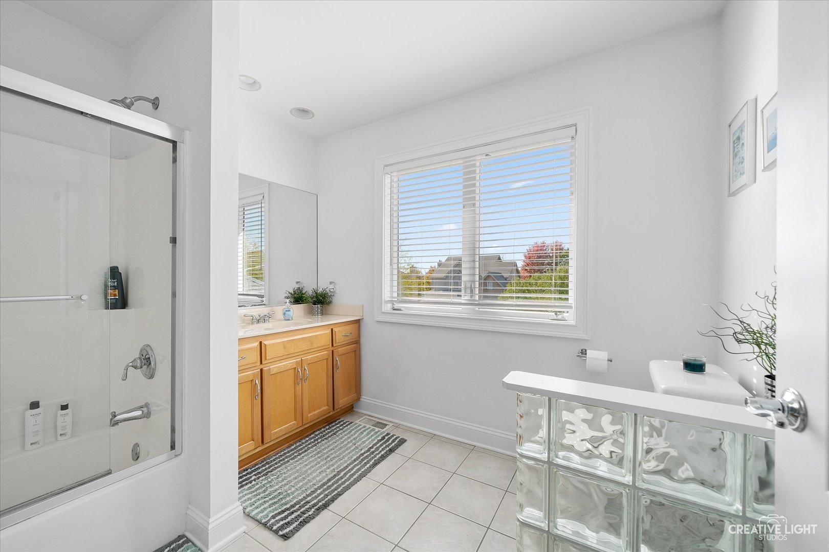 3912 Highknob Circle Naperville, IL 60564 - Photo 22 of 42 a spacious bathroom with a tub sink and mirror