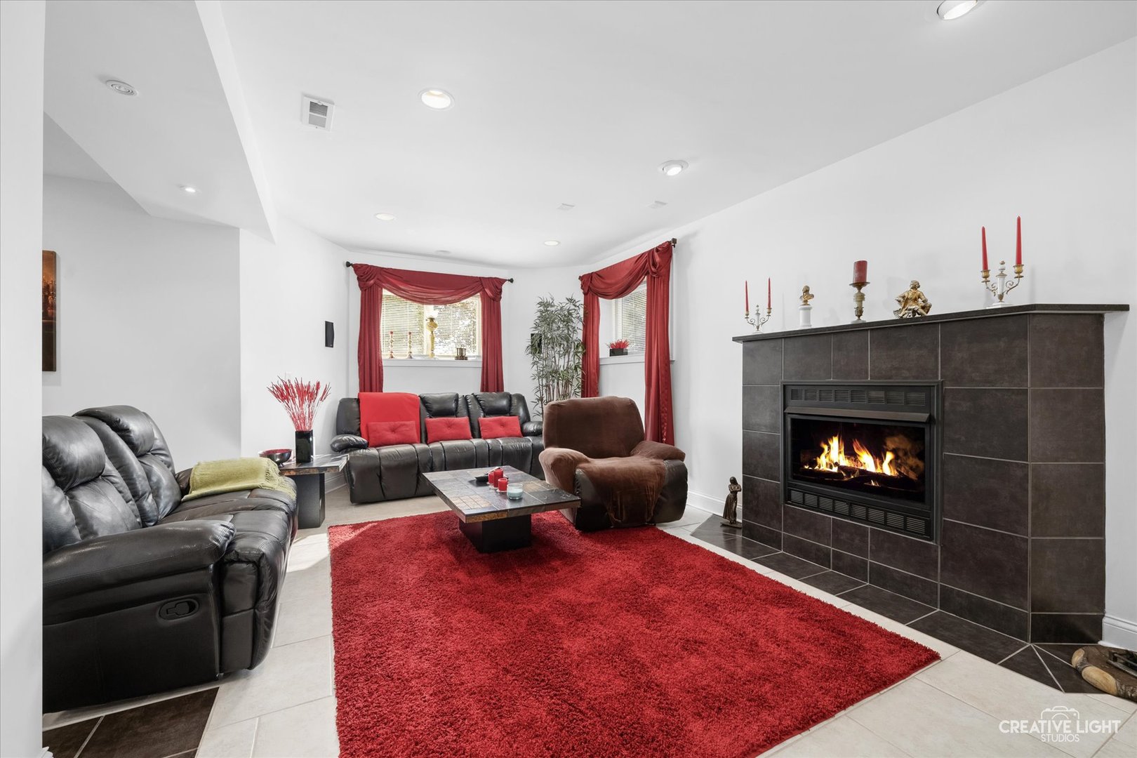 3912 Highknob Circle Naperville, IL 60564 - Photo 26 of 42 a living room with furniture a rug and a fireplace