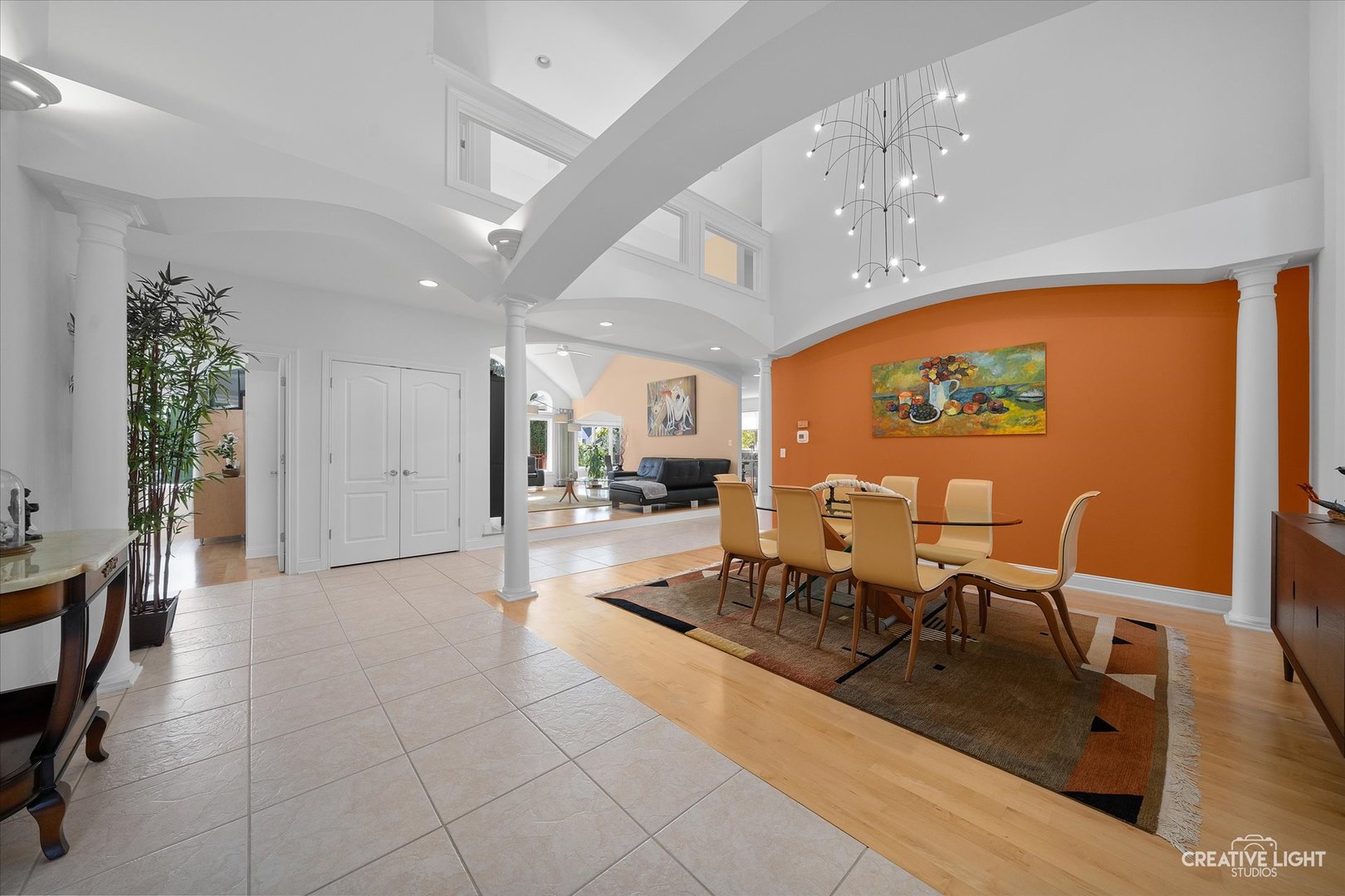 3912 Highknob Circle Naperville, IL 60564 - Photo 4 of 42 a living room with furniture a large window with table and chairs