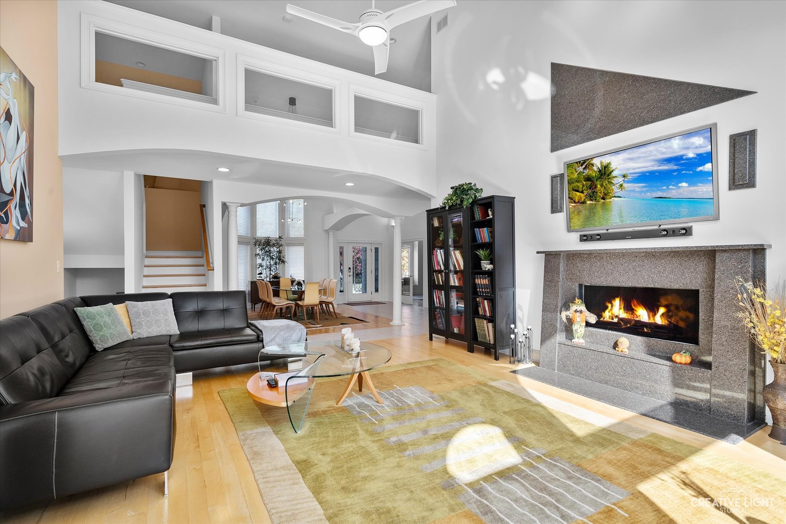 3912 Highknob Circle Naperville, IL 60564 - Photo 8 of 42 a living room with furniture and a fireplace