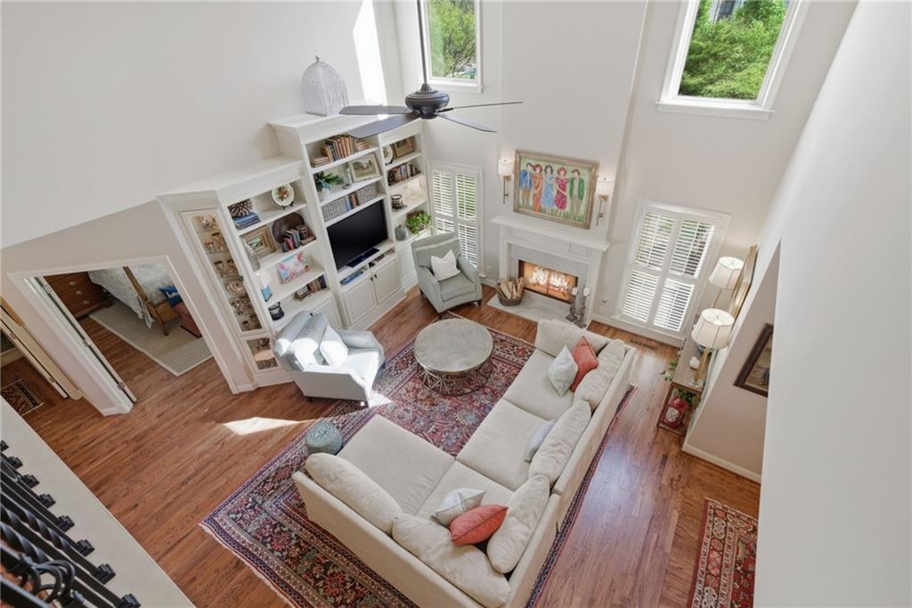 535 Brayford Way Suwanee, GA 30024 - Photo 21 of 55 a living room with furniture and a fireplace