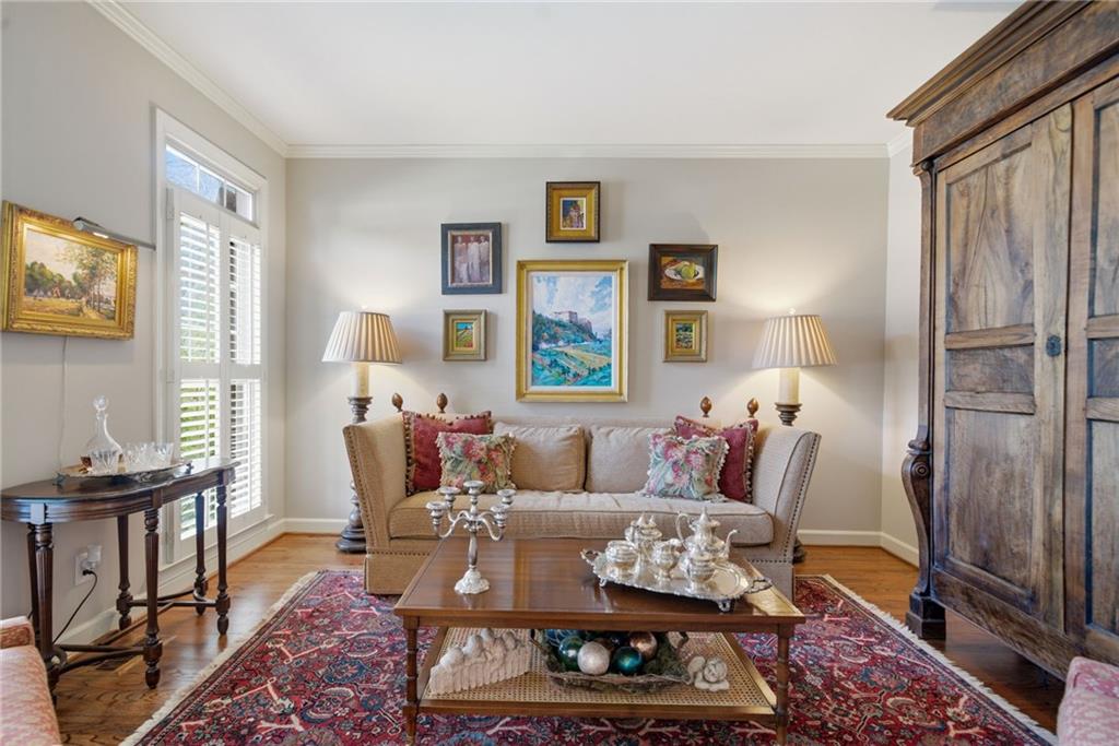 535 Brayford Way Suwanee, GA 30024 - Photo 5 of 55 a living room with furniture wooden floor and a window