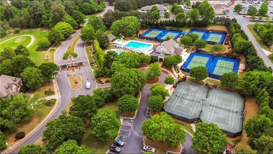 535 Brayford Way Suwanee, GA 30024 - Photo 53 of 55 an aerial view of residential house with outdoor space and swimming pool