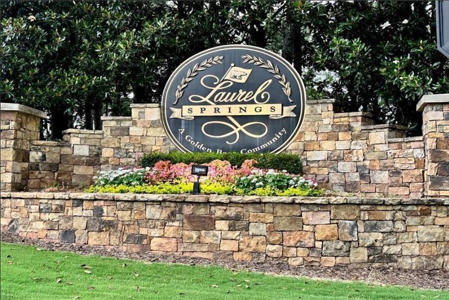 535 Brayford Way Suwanee, GA 30024 - Photo 54 of 55 a sign on the side of a building