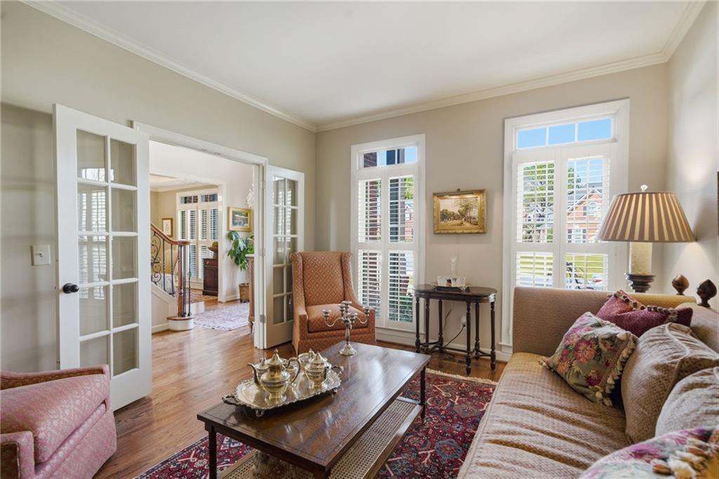 535 Brayford Way Suwanee, GA 30024 - Photo 6 of 55 a living room with furniture and wooden floor