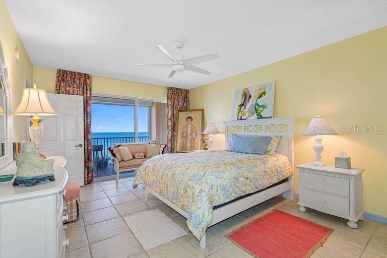 16550 Gulf Boulevard, Unit 545 North Redington Beach, FL 33708 - Photo 24 of 64 a bedroom with a bed and a couch
