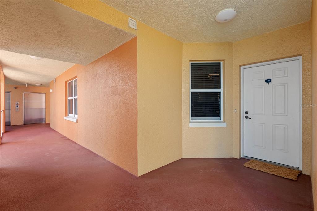16550 Gulf Boulevard, Unit 545 North Redington Beach, FL 33708 - Photo 4 of 64 a view of an empty room with a window