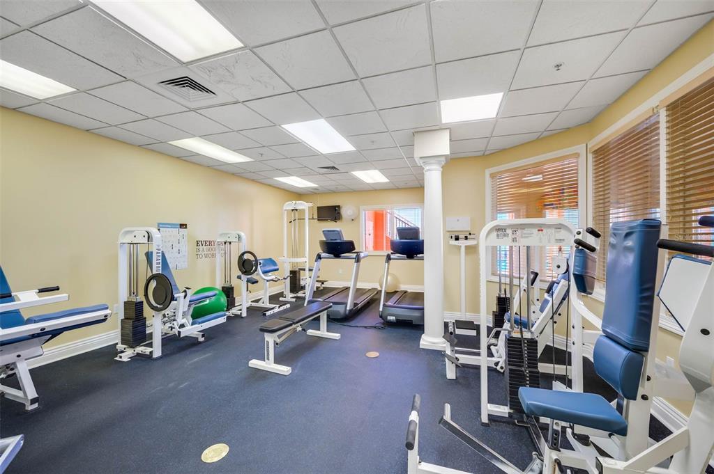 16550 Gulf Boulevard, Unit 545 North Redington Beach, FL 33708 - Photo 56 of 64 a view of a room with gym equipment