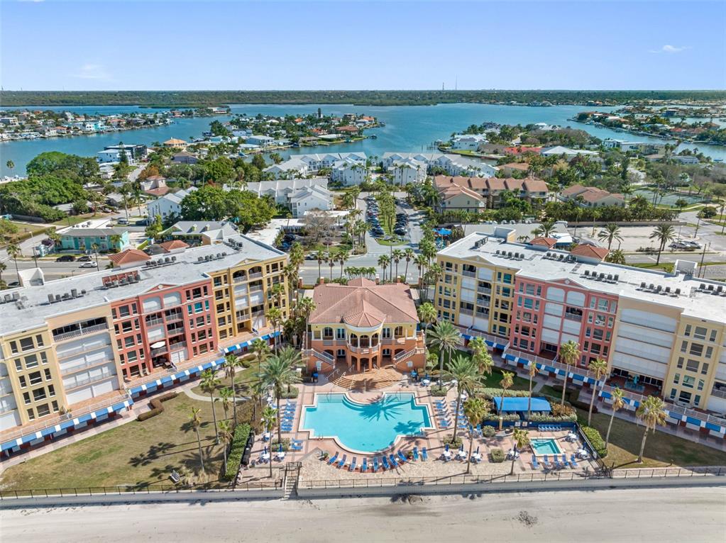 16550 Gulf Boulevard, Unit 545 North Redington Beach, FL 33708 - Photo 62 of 64 an aerial view of a city with lots of residential buildings and mountain view in back