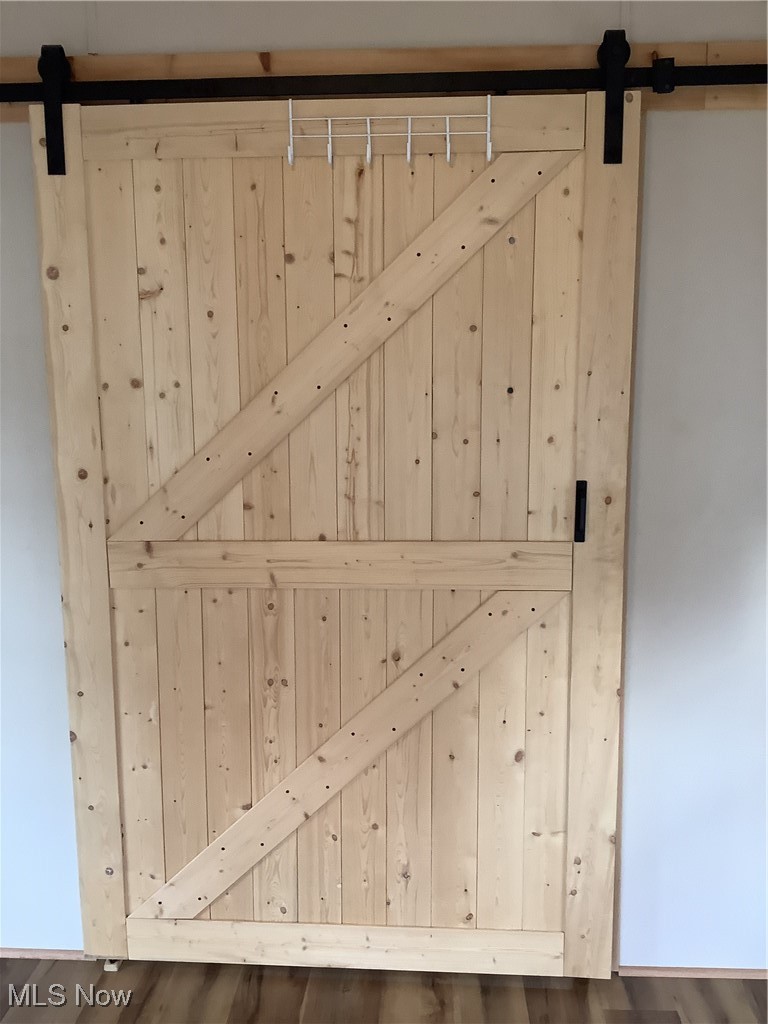 8927 Columbus Road Mount Vernon, OH 43050 - Photo 12 of 35 Barn door in bonus room leading into kitchen.