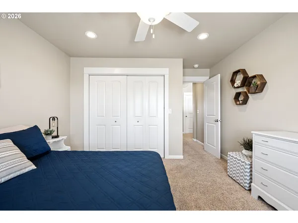a view of room with furniture and wooden floor