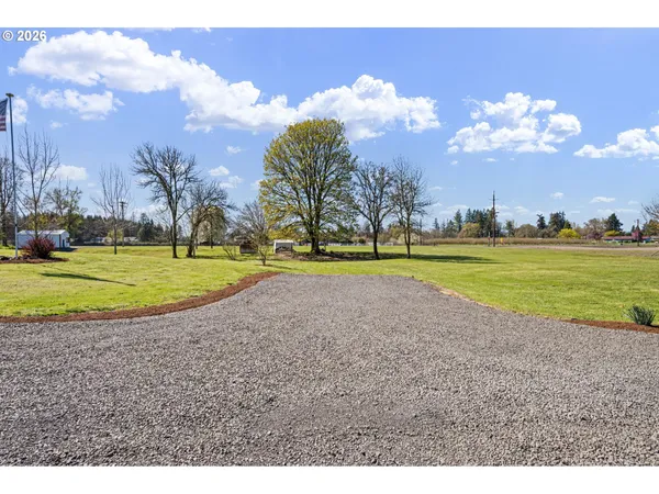 a view of a golf course with a lake