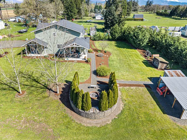 a view of a swimming pool with a yard