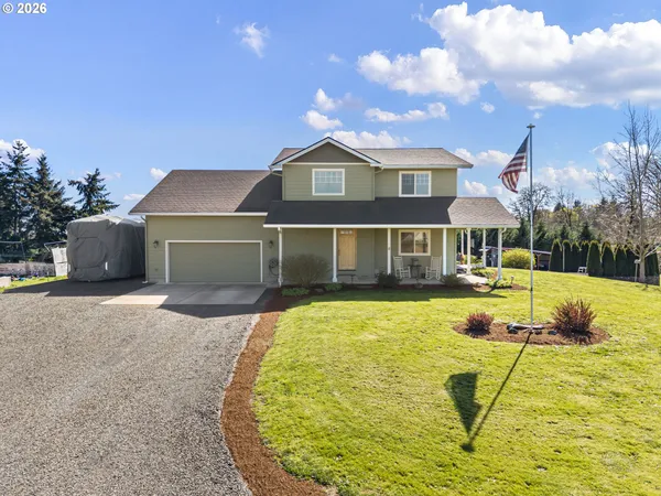 a front view of a house with swimming pool