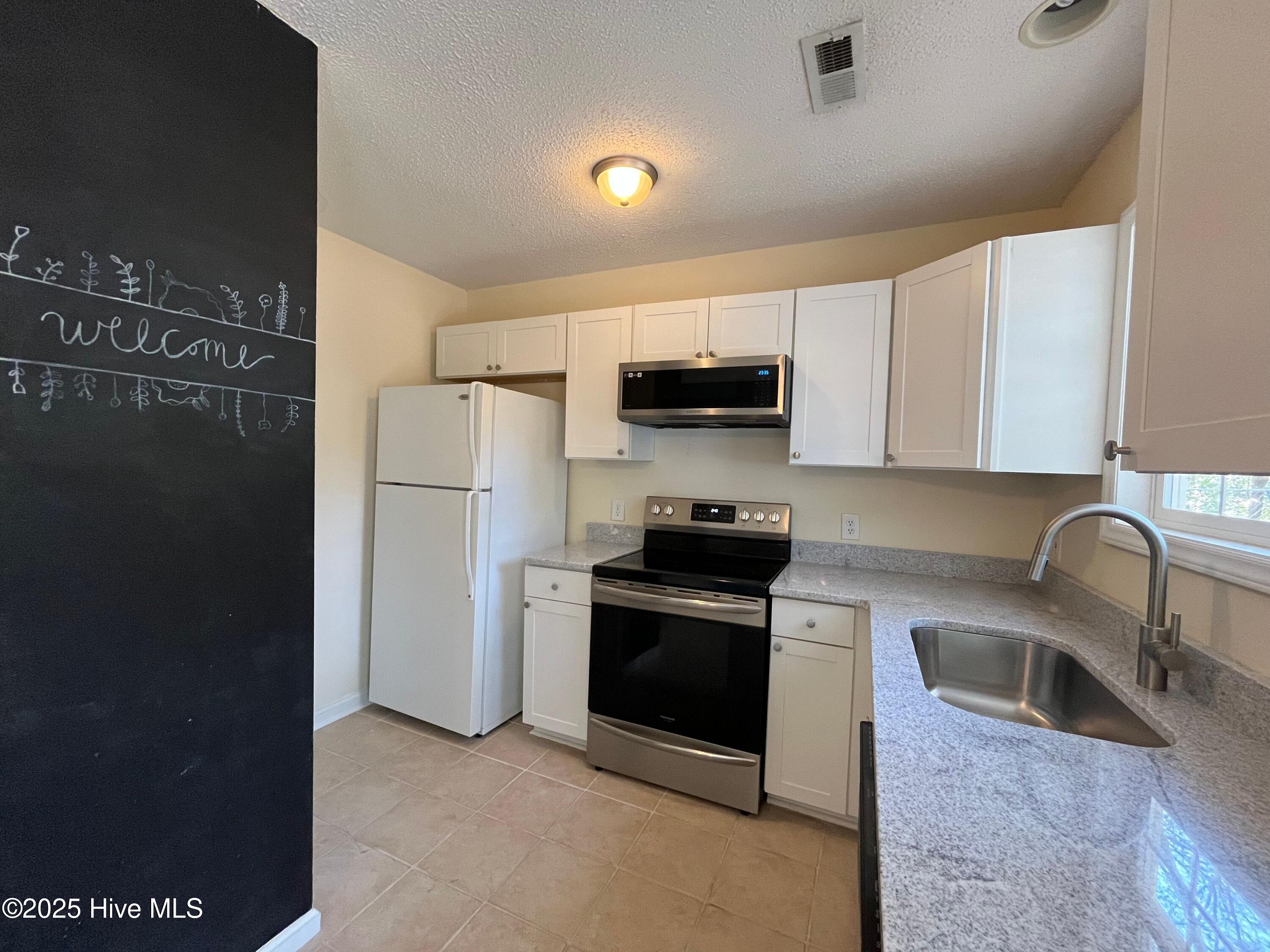 907 North Sycamore Street Aberdeen, NC 28315 - Photo 7 of 17 907 kitchen 1