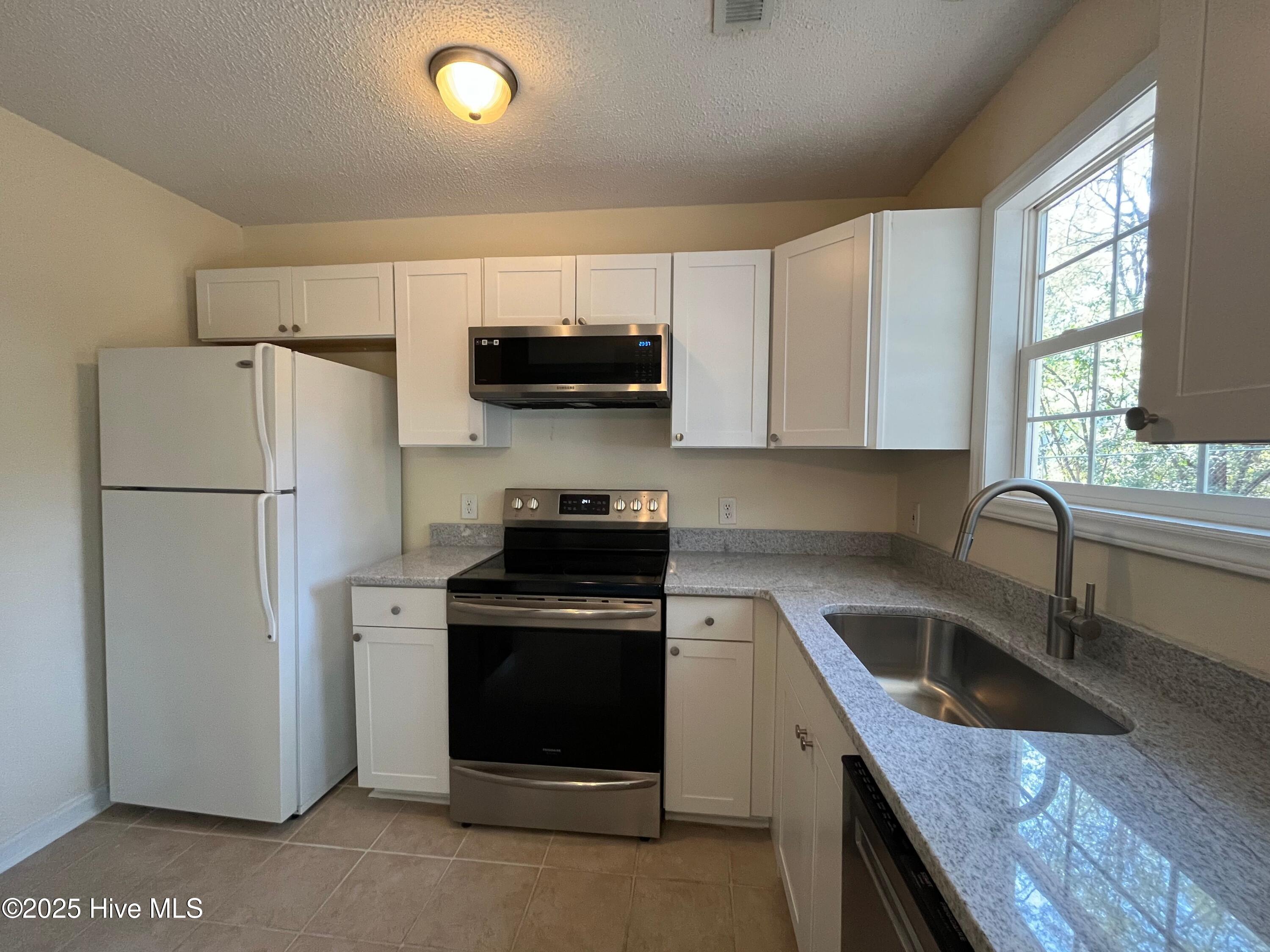 907 North Sycamore Street Aberdeen, NC 28315 - Photo 8 of 17 907 kitchen 3