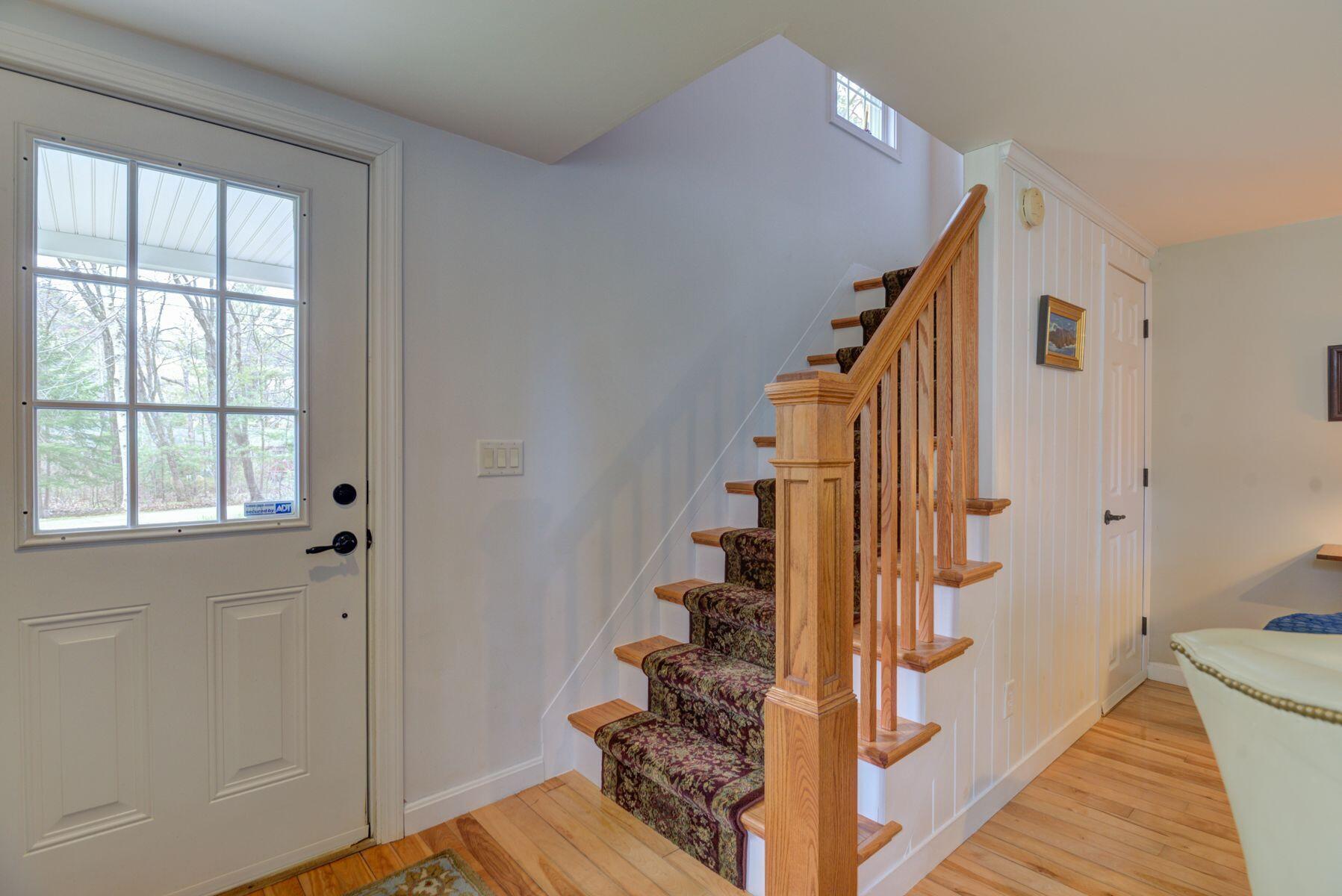 44 Hardy's Bluff Wells Wells, ME 04090 - Photo 16 of 30 Front entrance with stairs to upstairs.