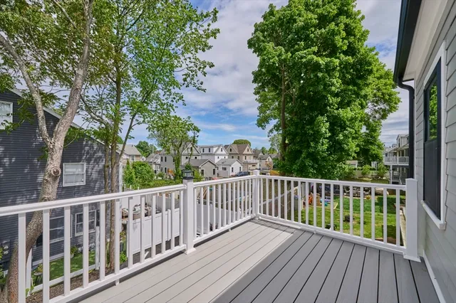 a view of a wooden roof deck