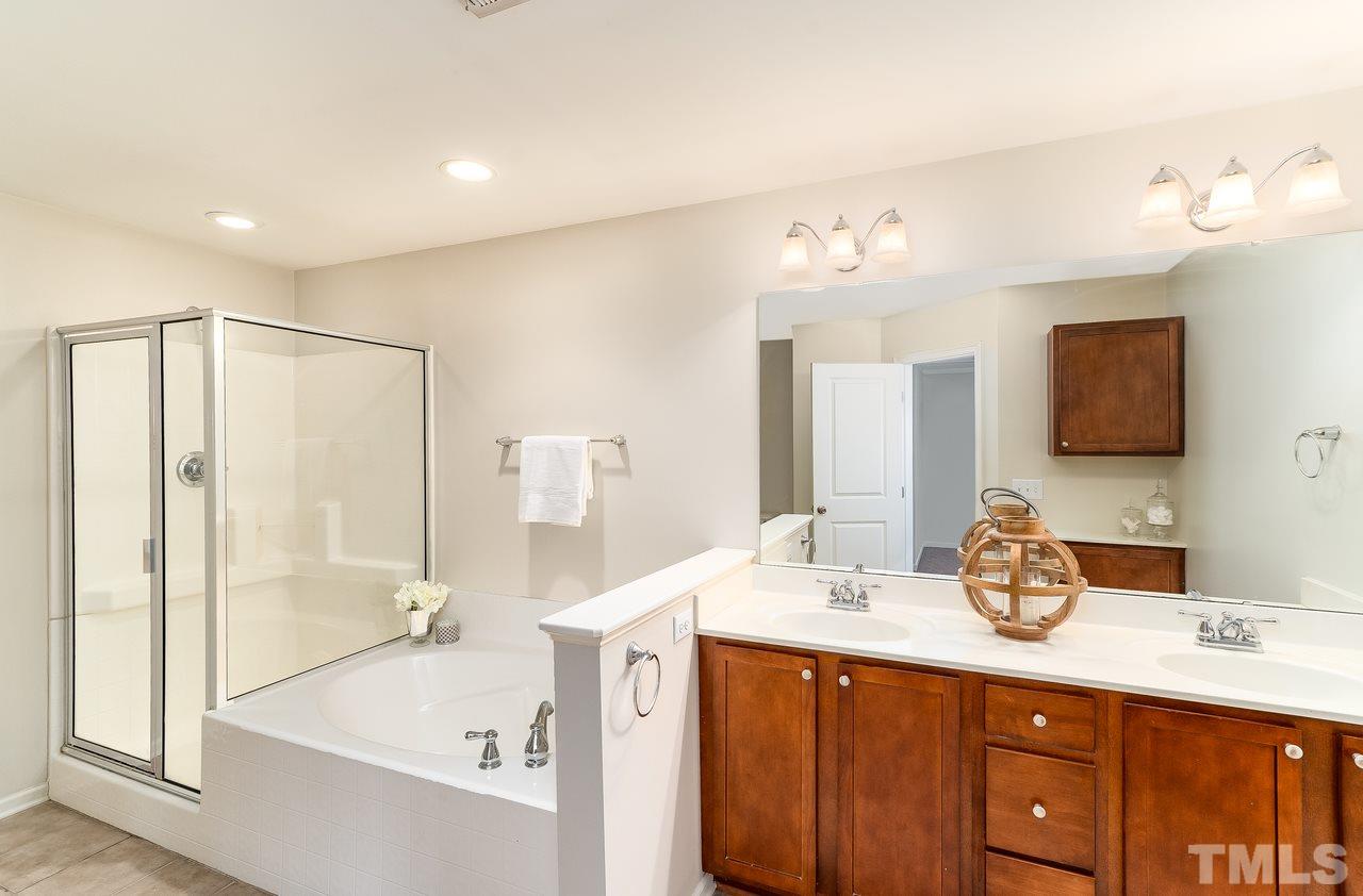 2707 Cloud Mist Circle Raleigh, NC 27614 - Photo 15 of 28 Dual vanity, garden tub, walk-in shower.