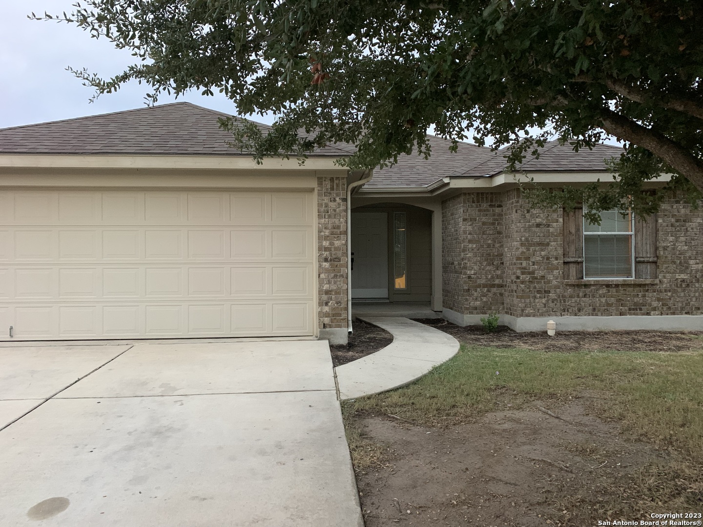 4618 Everett Loop Converse, TX 78109 - Photo 1 of 20 a front view of a house with garden