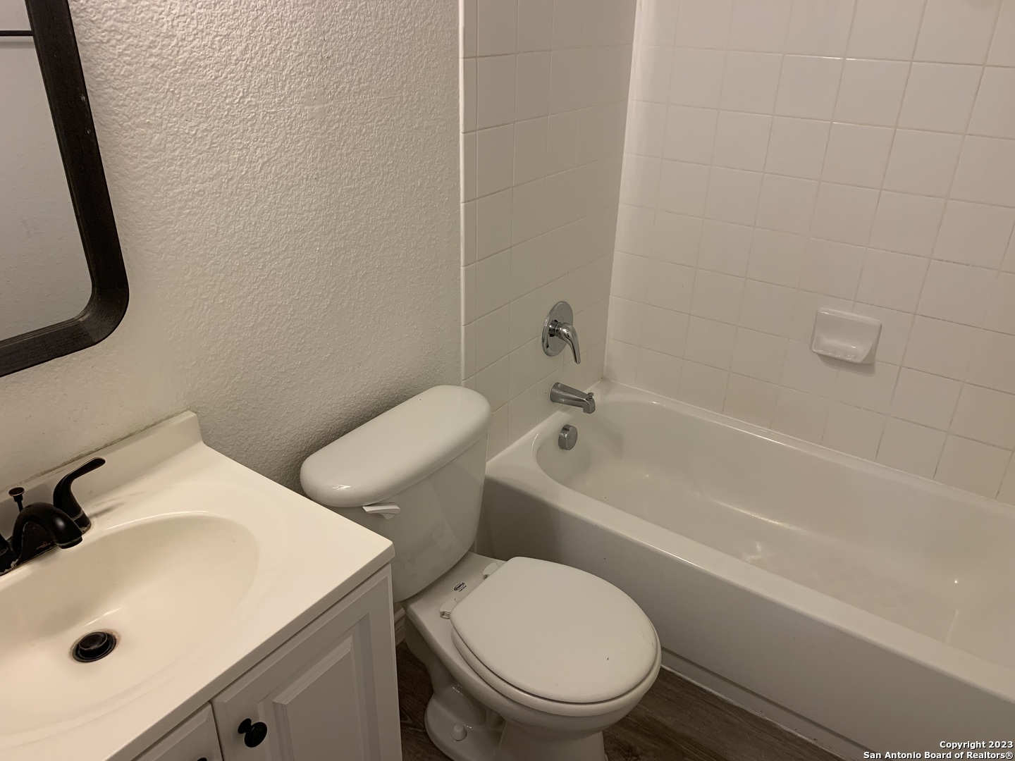 4618 Everett Loop Converse, TX 78109 - Photo 13 of 20 a white toilet sitting next to a bath tub